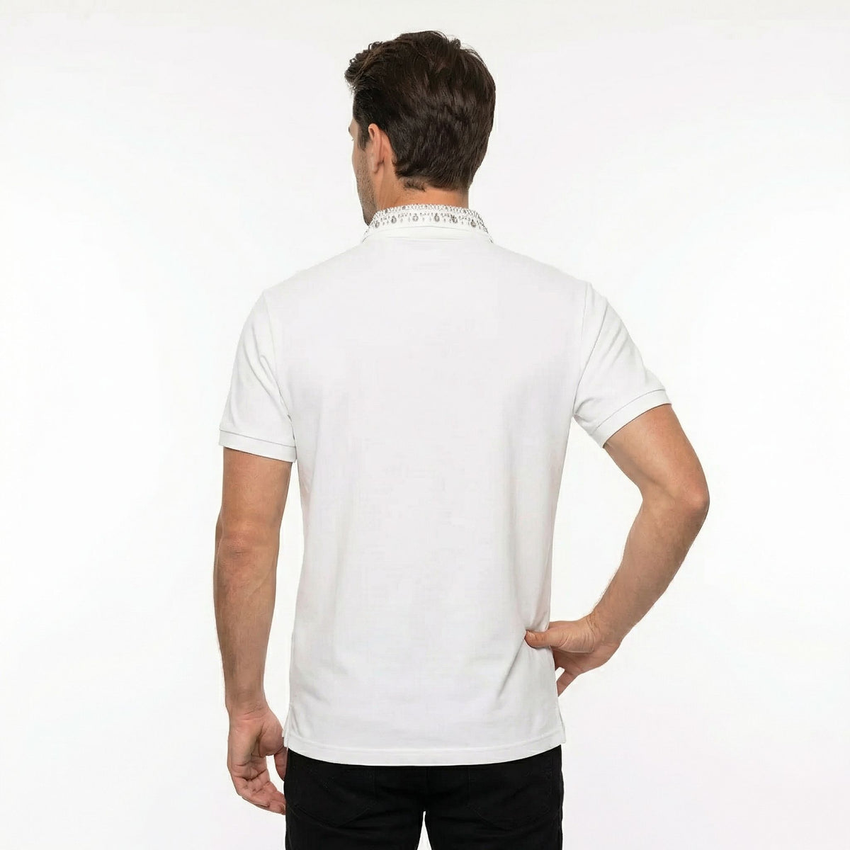 Men's white vintage Watson sport polo shirt by JEVPE with graphic design, short sleeves, and studded collar for retro athletic style.