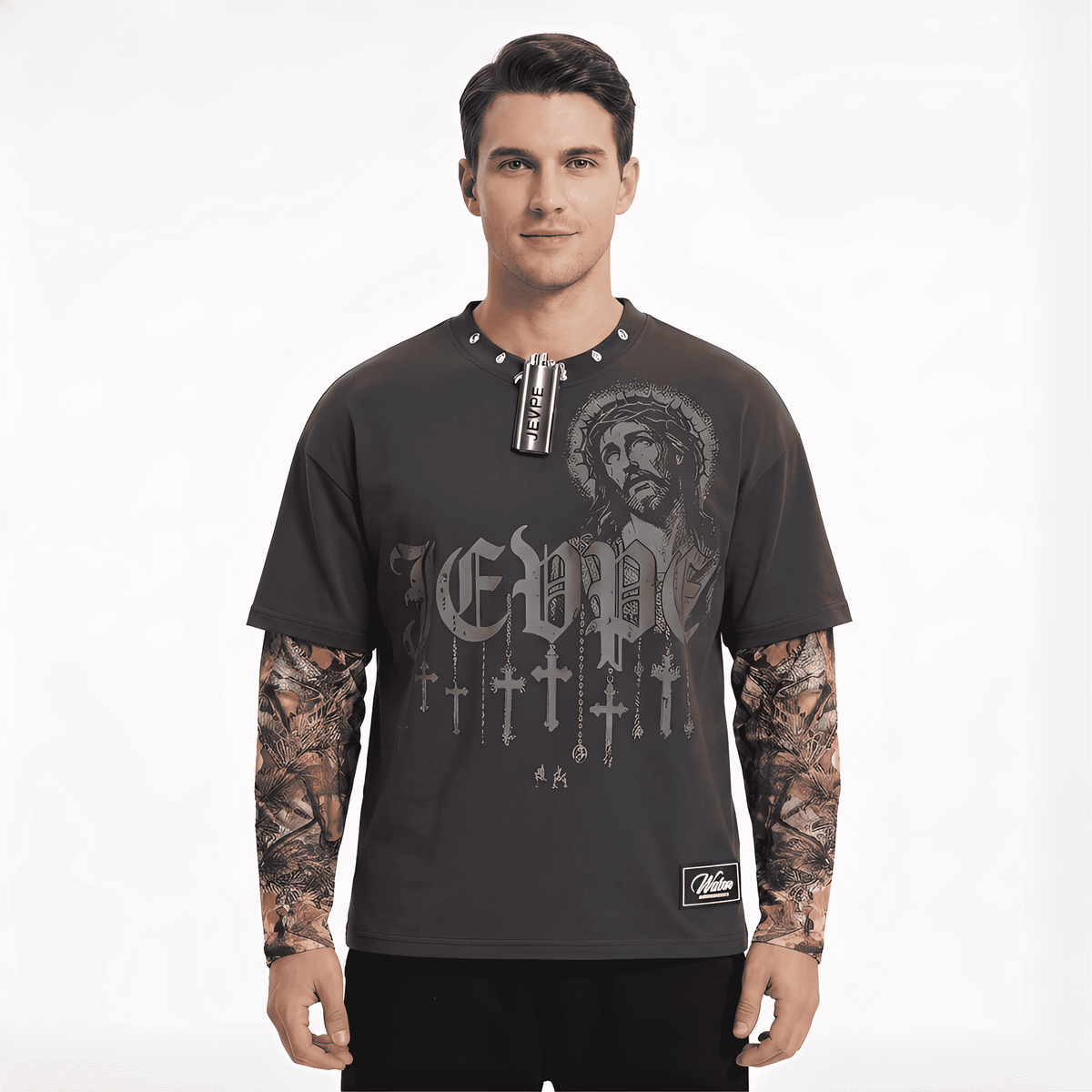JEVPE men's dark grey faux layer long sleeve T-shirt with gothic Jesus graphic, cross print, chain detail, and studded neckline.