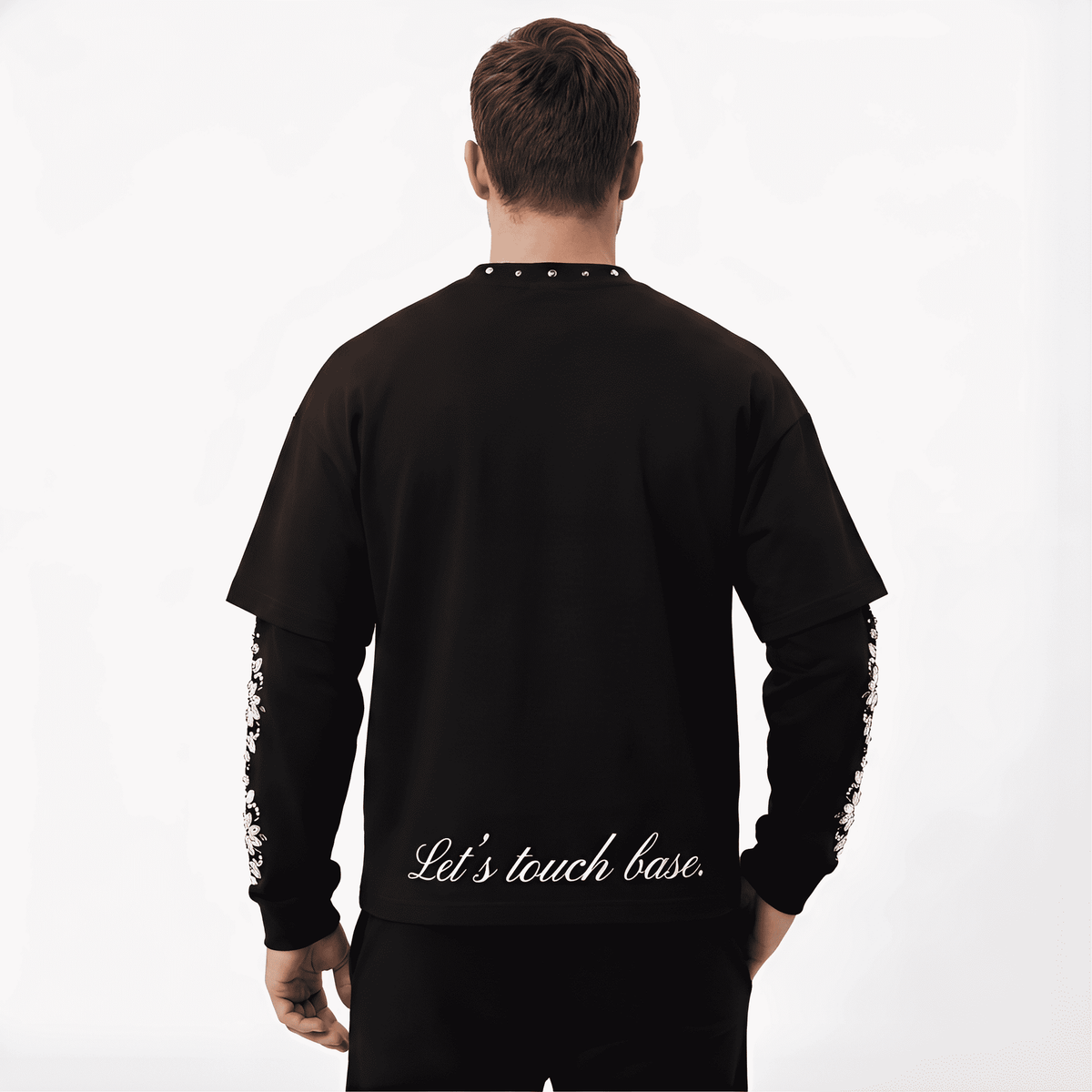 Black JEVPE men's long sleeve T-shirt with angel graphic, studded details, gothic religious art streetwear top, casual and stylish.