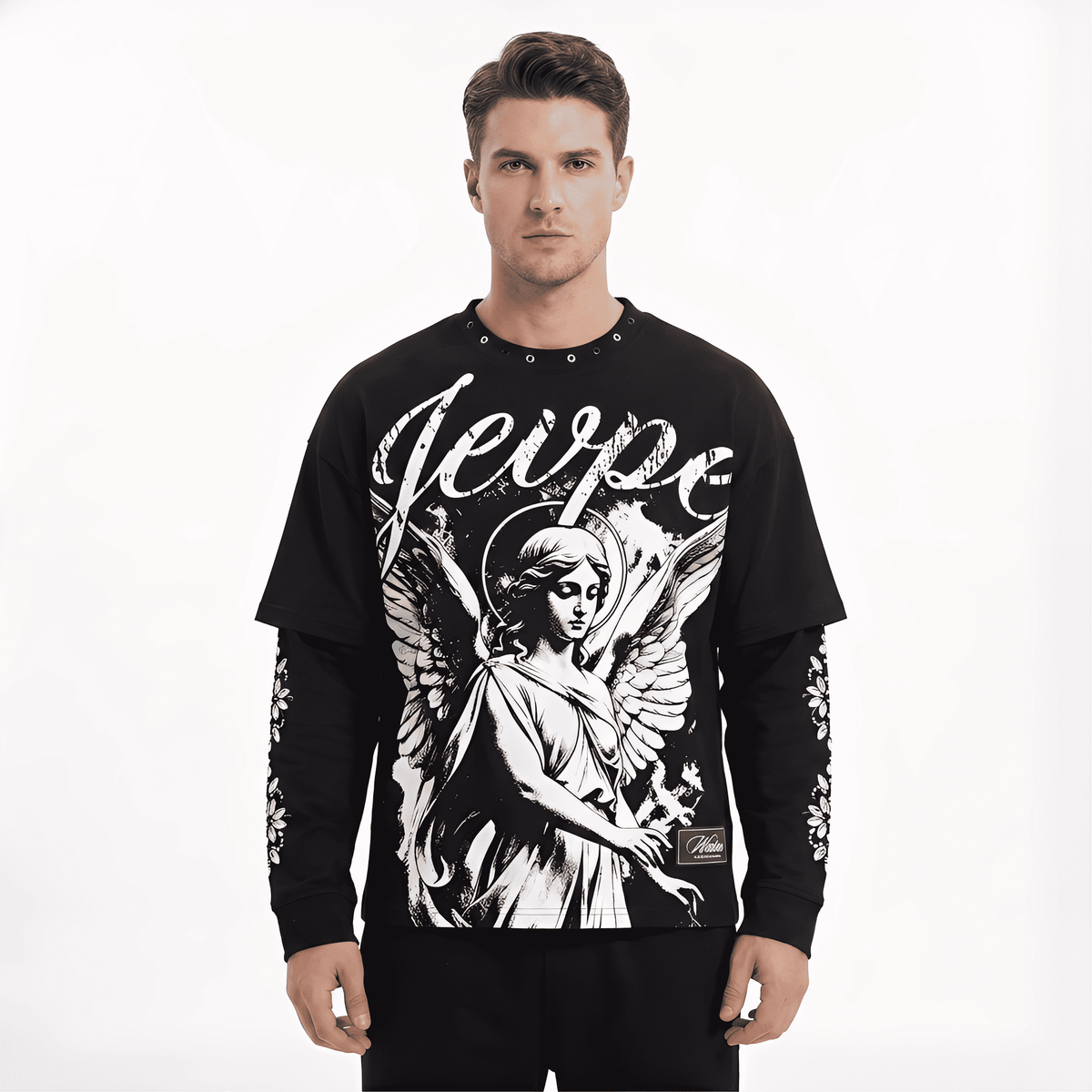 Black Gothic T-shirt by JEVPE featuring angel graphic, studded details, long sleeves, and streetwear style with religious art design.