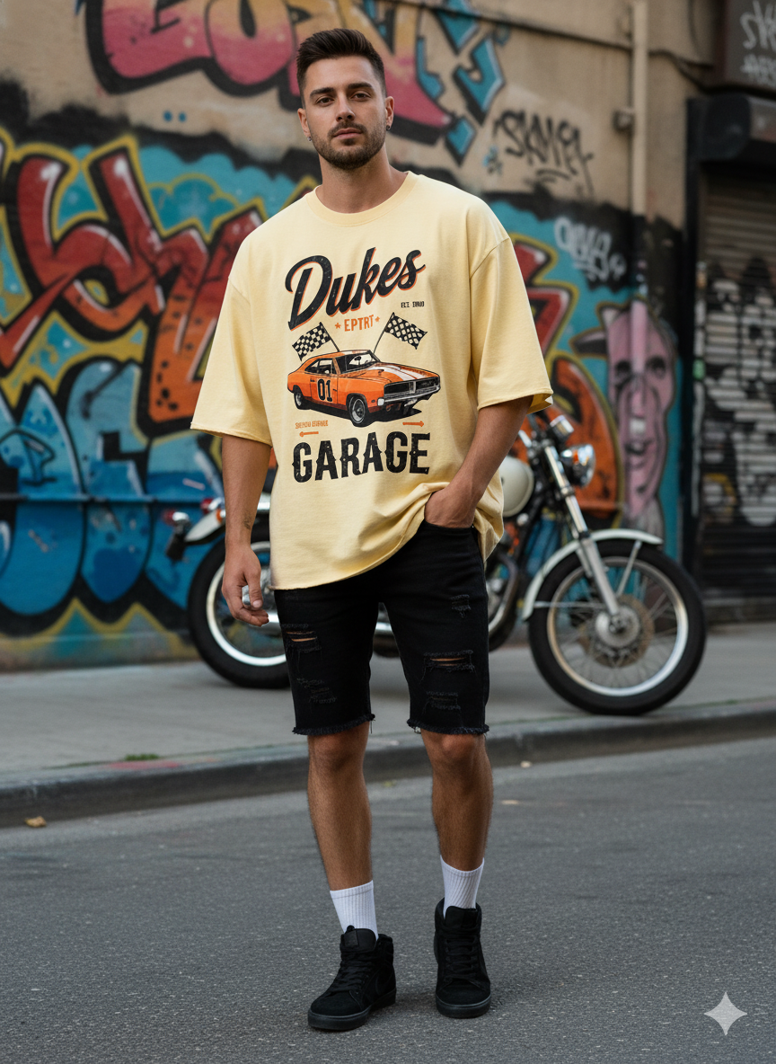 Vintage beige oversized T-shirt featuring a JEVPE Dukes Garage racing car graphic and muscle car design.