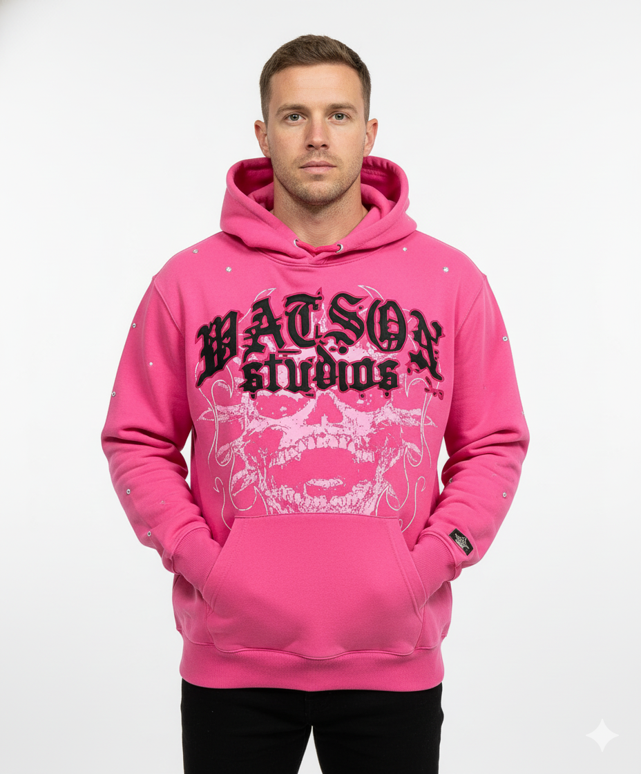 Pink oversized hoodie from JEVPE featuring a guitar rose graphic and "Raised On Classic Rock" slogan on the front.