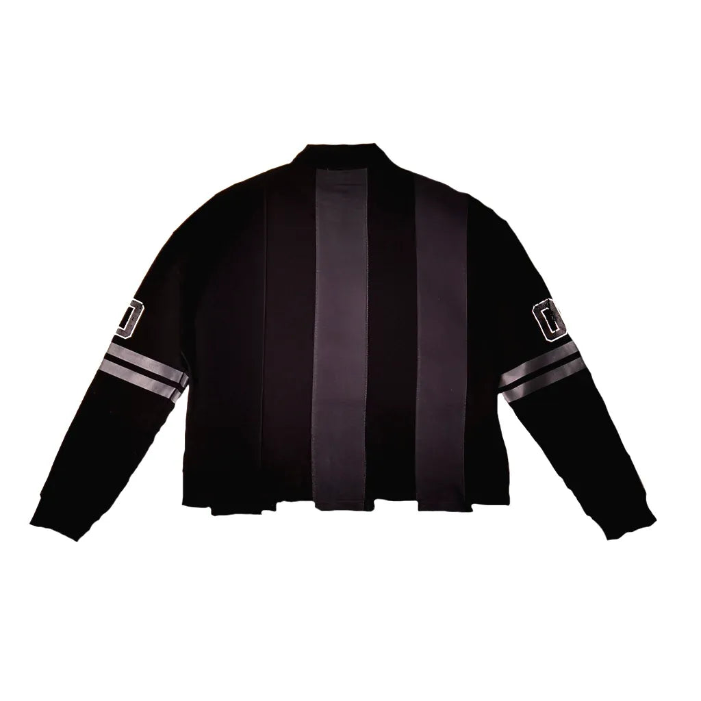JEVPE black and dark gray striped rugby shirt with script graphic, long sleeves, casual athletic style.
