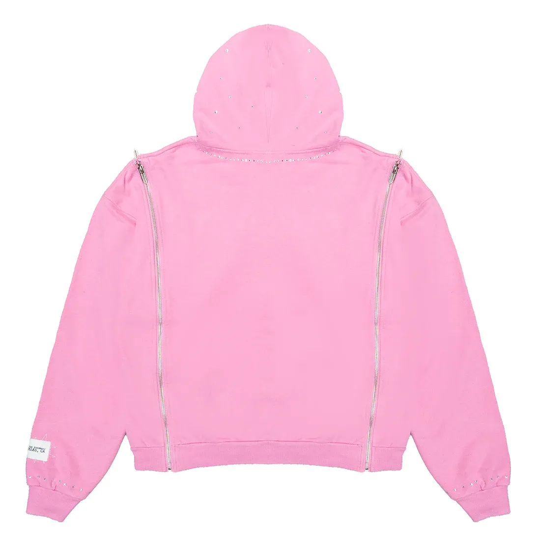 Pink oversized hoodie by JEVPE featuring Gothic Jesus graphic, rhinestones, multi-zip design, and hooded style.