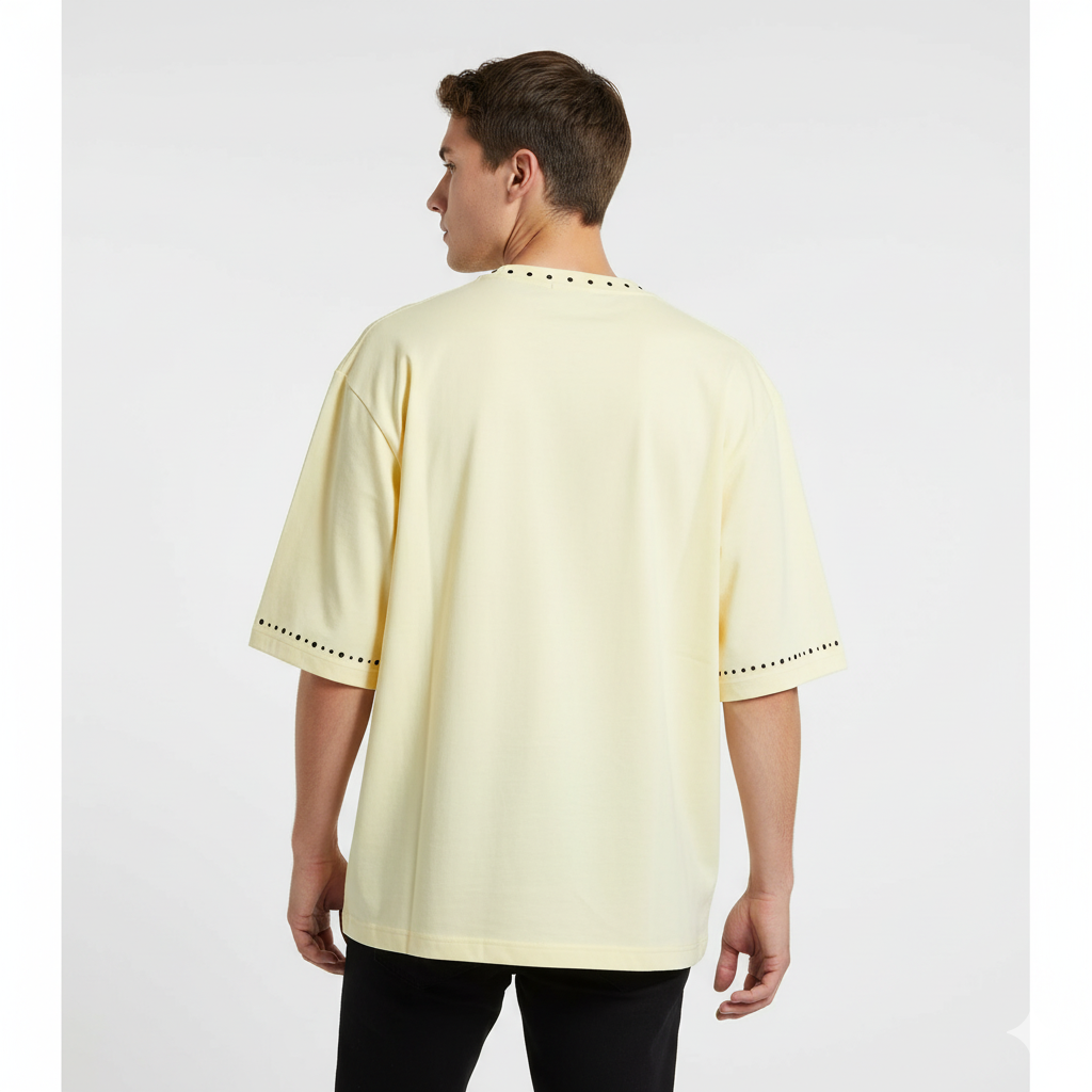 JEVPE black cat print oversized streetwear T-shirt in beige with graffiti text and rivet details, casual short sleeve design