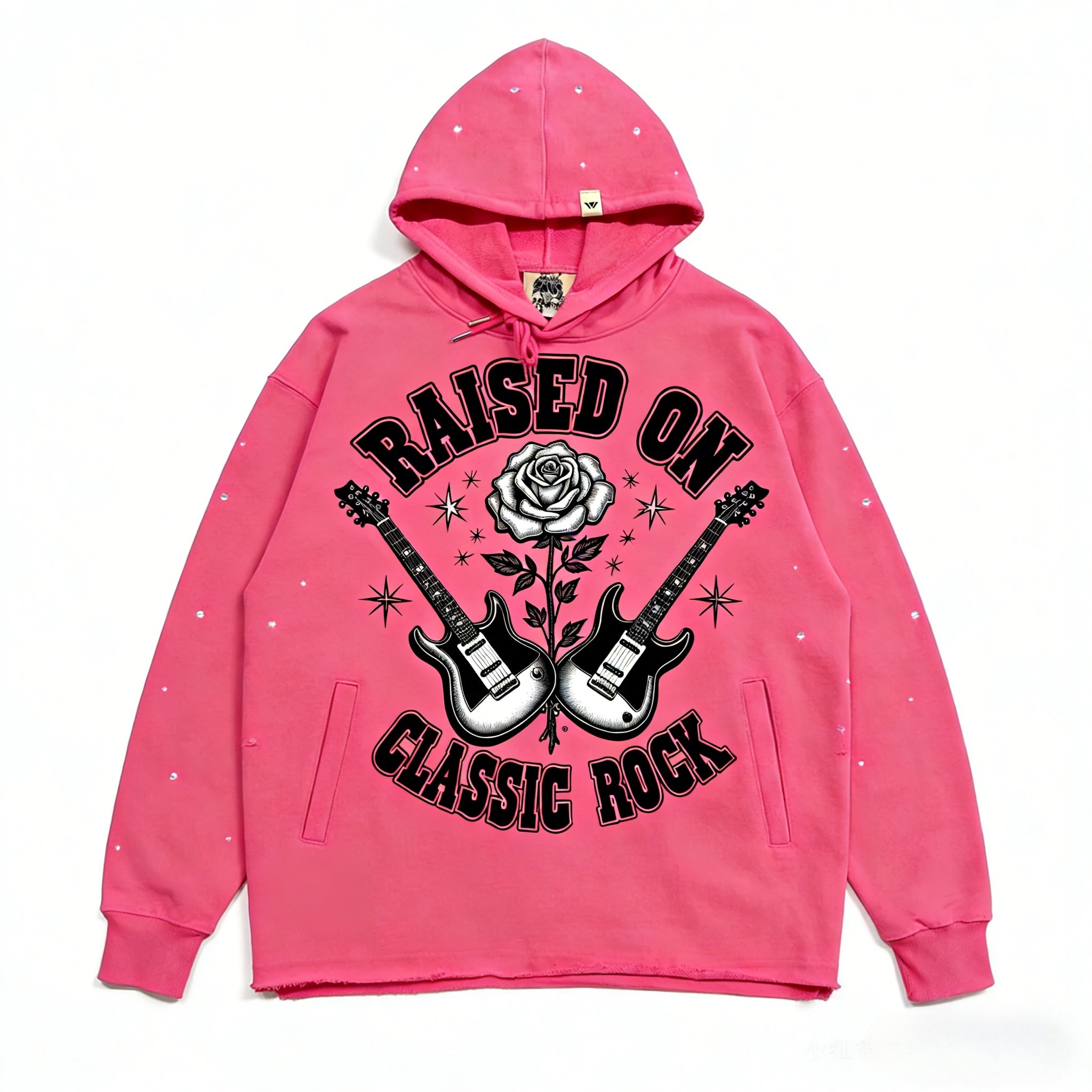 Pink oversized hoodie by JEVPE featuring a guitar rose graphic and "Raised On Classic Rock" text on the front.