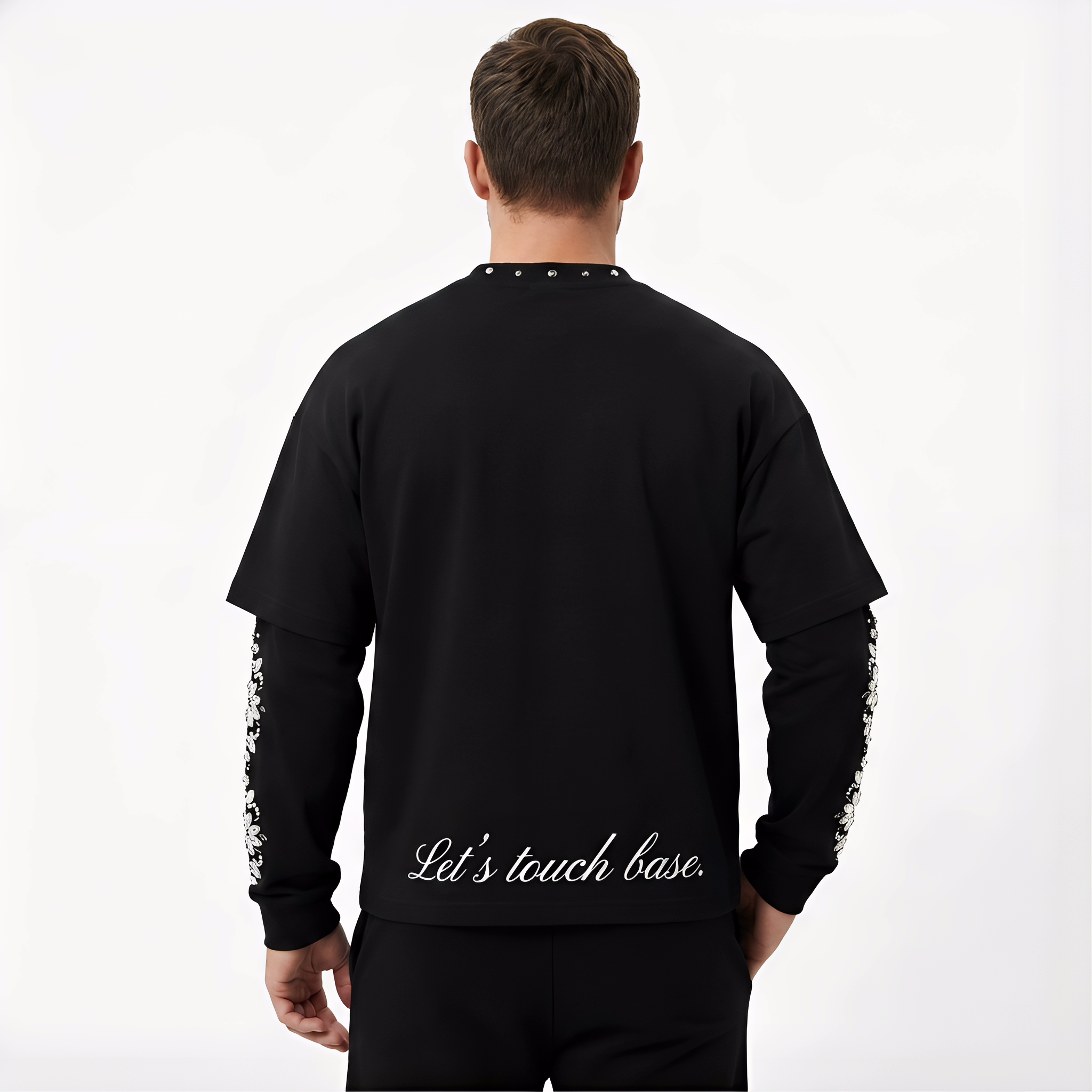 Black JEVPE men's long sleeve T-shirt with angel graphic, studded details, gothic religious art streetwear top, casual and stylish.