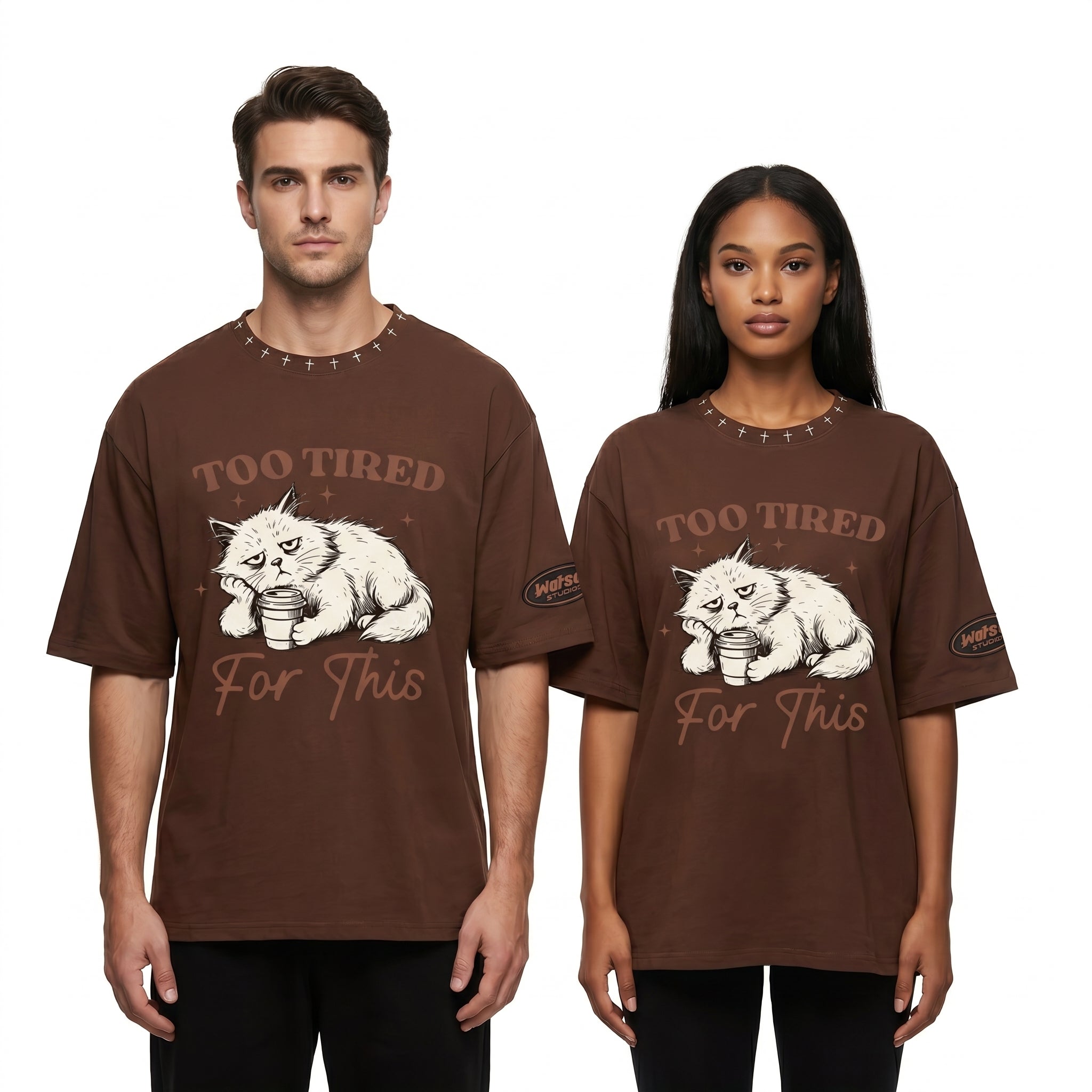 Brown oversized streetwear T-shirt featuring a grumpy cat graphic and the phrase "Too Tired For This" by JEVPE.