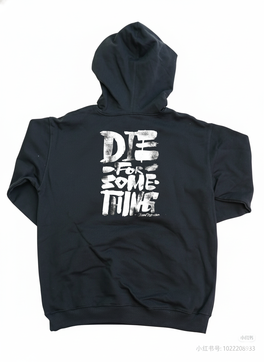 Black oversized hoodie by JEVPE featuring gothic skull and sword graphic design on the front.