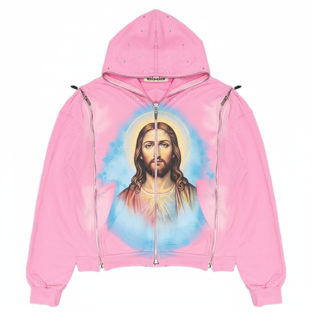 Pink oversized hoodie with gothic Jesus graphic and rhinestone accents, featuring multiple zip pockets and a hood from JEVPE.