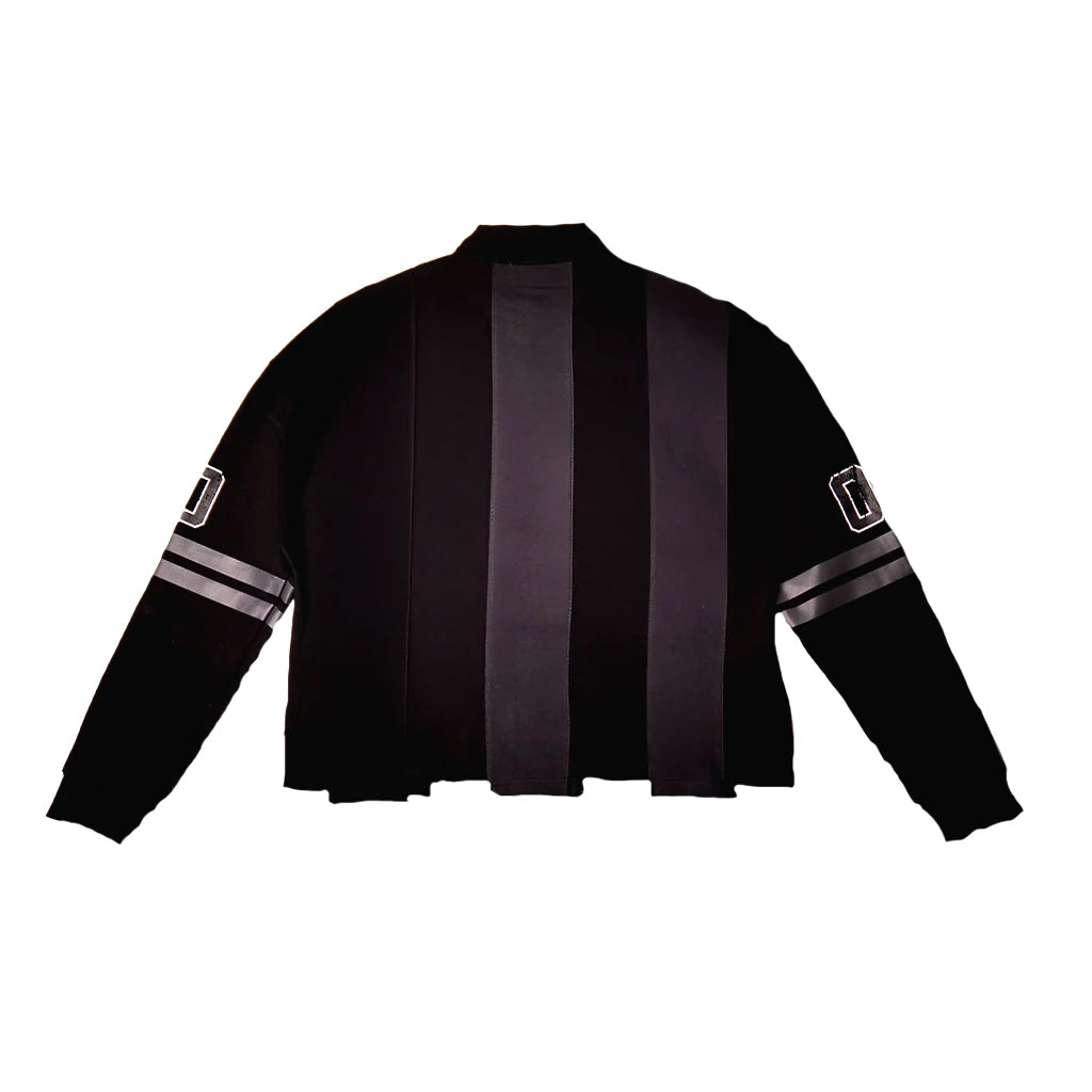 JEVPE black and dark gray striped rugby shirt with script graphic, long sleeves, casual athletic style.